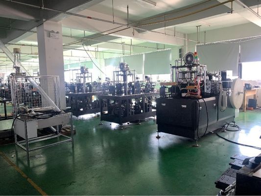 Macchine per la lavorazione della carta a rulli per la fabbricazione di tazze di carta